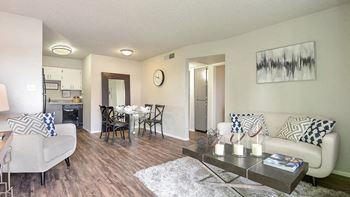 a living room with a couch and a table